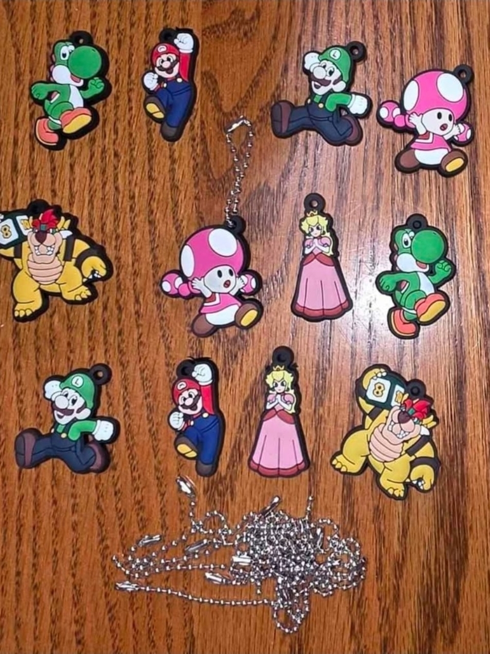 Nintendo Super Mario Character Silicone Charm Set - Pink, Green, Yellow